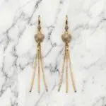 Aretes Estrella Radiante en Baño de Oro Real 18K y Cobre Ecológico SGS hipoalergénico libre de níquel - D'moé Joyería